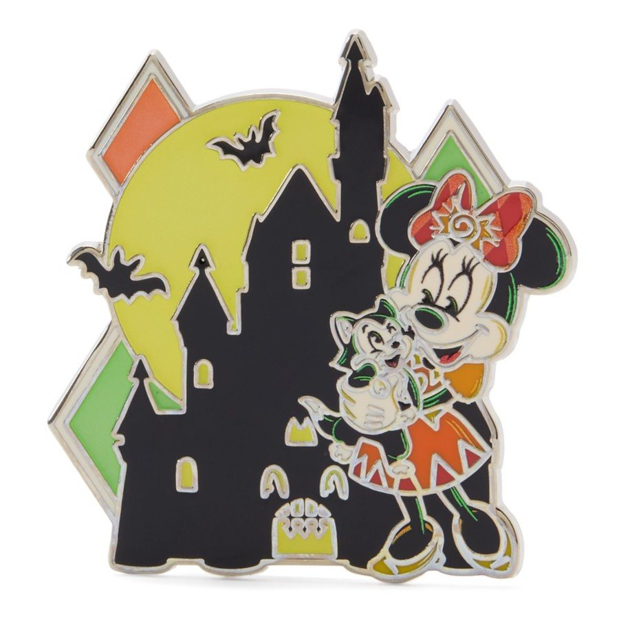 Minnie Mouse and Figaro glow-in-the-dark Happy Halloween pin in front of a spooky castle